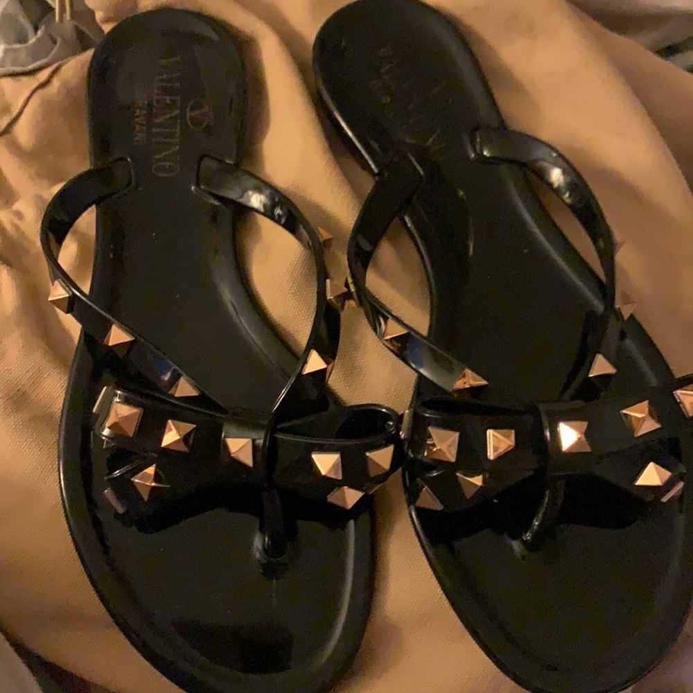 Valentino rubber rock stud flip flops.  Worn a few times.  Make an offer